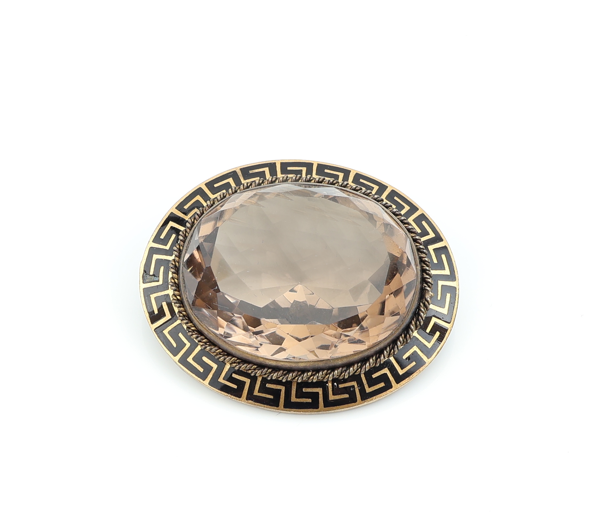 Detail a: Rauchquarz-Brosche, um 1920, Metall verg., mittig gr. ovalfacett. Rauchquarz, schlichte Fassung mit Mäanderband aus schwarzem Hartlack, ca. 4.5 x ...