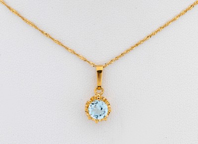 Image 14 kt gold topaz-pendant , YG 585/000, unpretentious design, round bevelled blue topaz ...