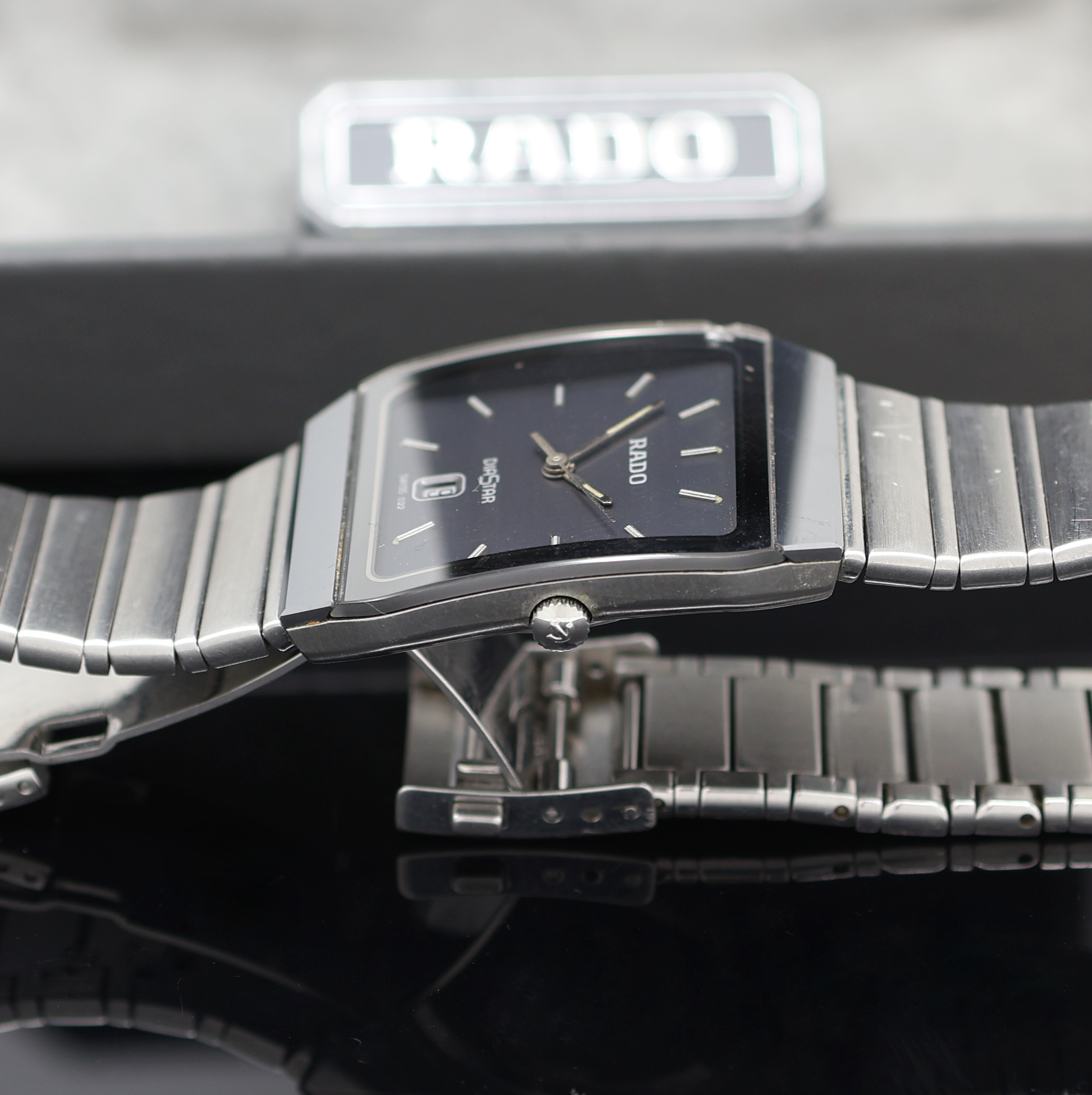 Detail c: RADO Diastar Armbanduhr Referenz 129.0266.3,Schweiz um 1995, quarz, Edelstahlgeh. inkl. orig. Gliederband m. dopp. Faltschl., Boden aufgedr., graues ...