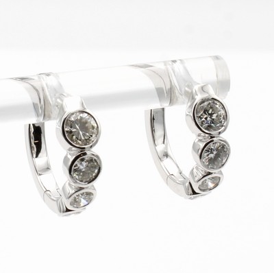 27122618a - Paar Klappcreolen mit Brillanten, WG 750/000, 8 Brill. zus. ca. 0.79 ct Weiß/vs, D. ca. ...