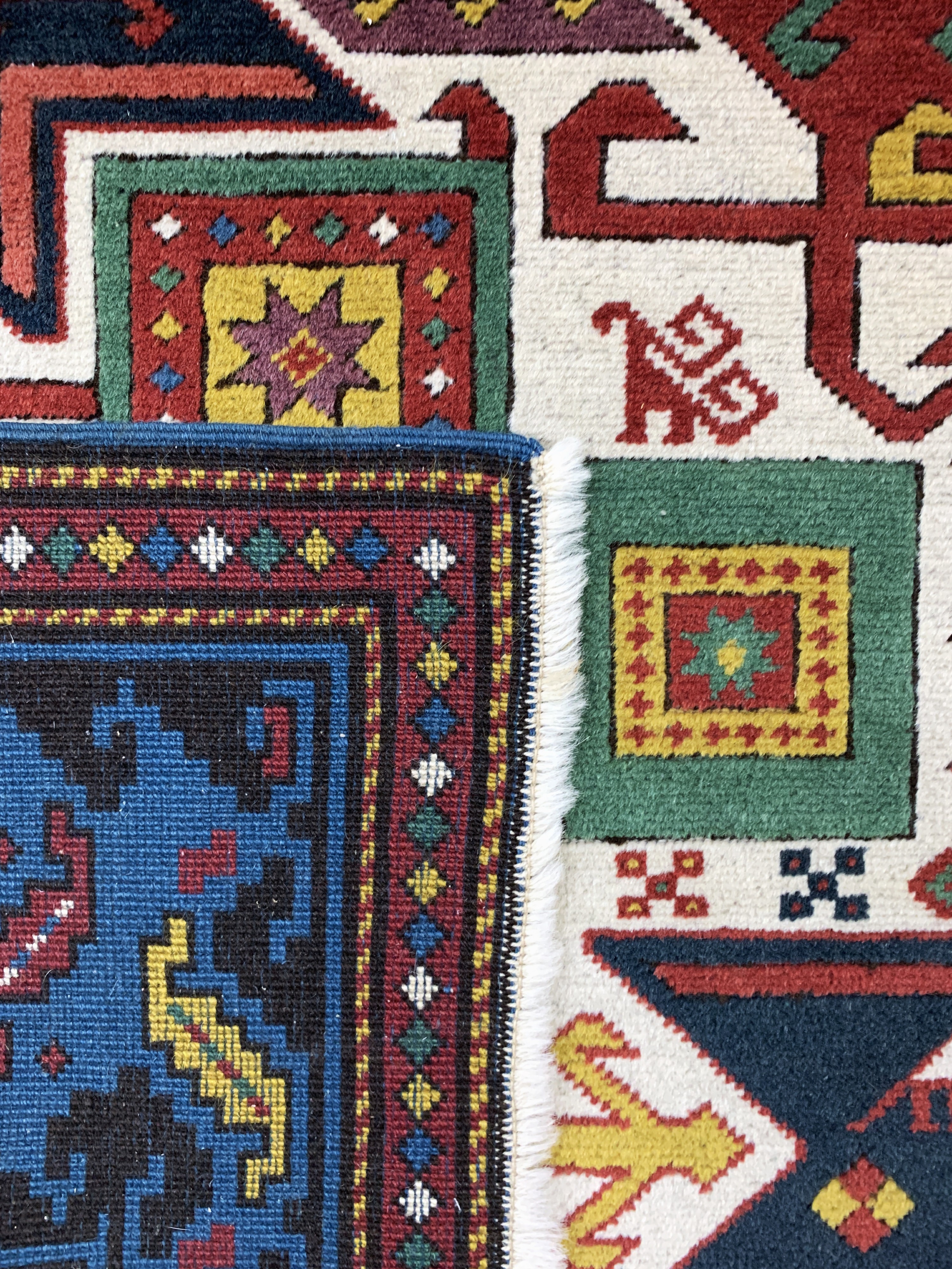 Detail j: Kopie eines"Stern-Kazak", Türkei, Ende 20.Jhd, Wolle auf Wolle, ca. 265 x 205 cm, EHZ: 2