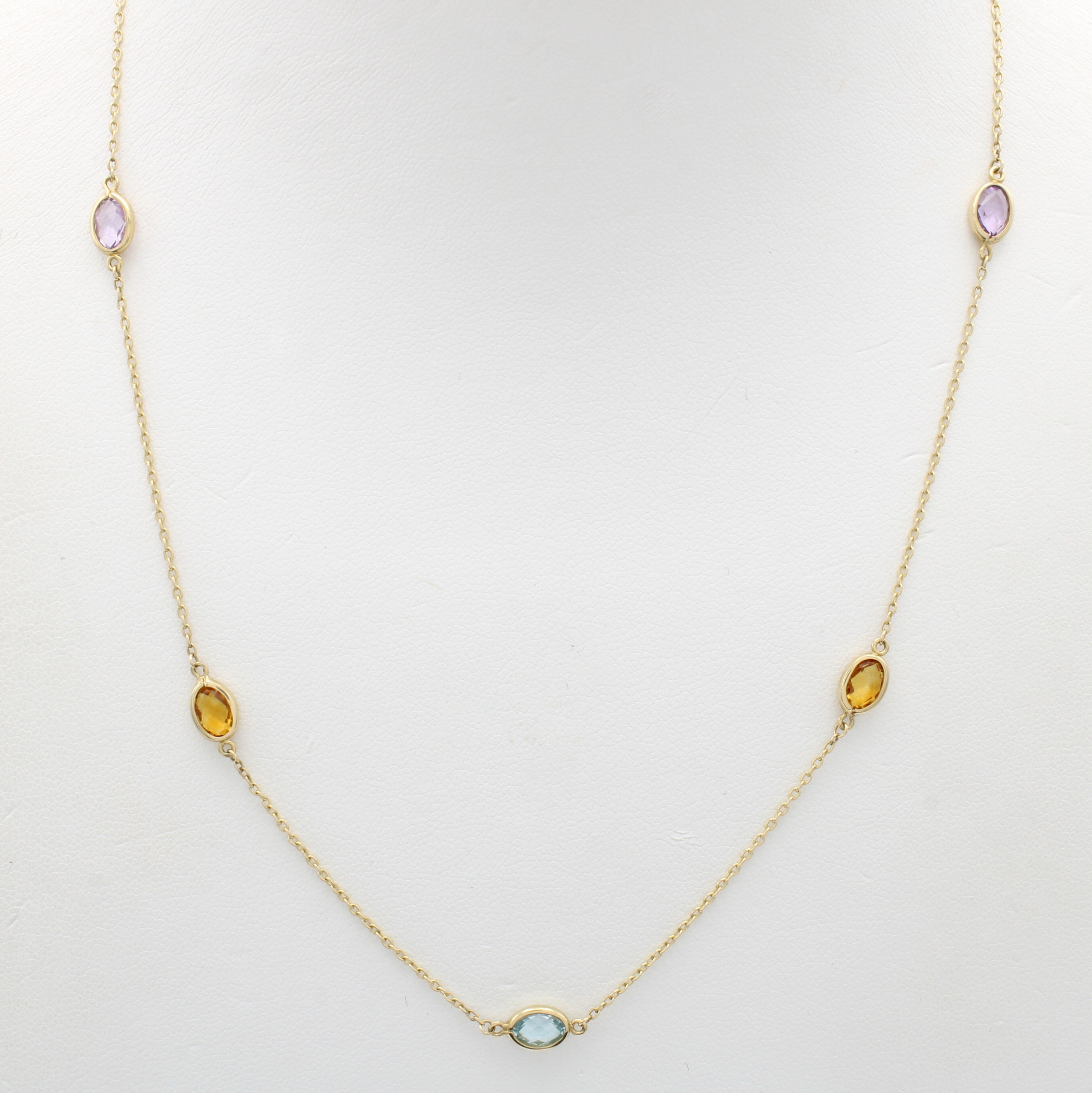 Image 27123111 - Collier mit Farbsteinen, GG 585/000, ovale, fac. Citrine, Amethyste u. Blautopas (beh.), ...