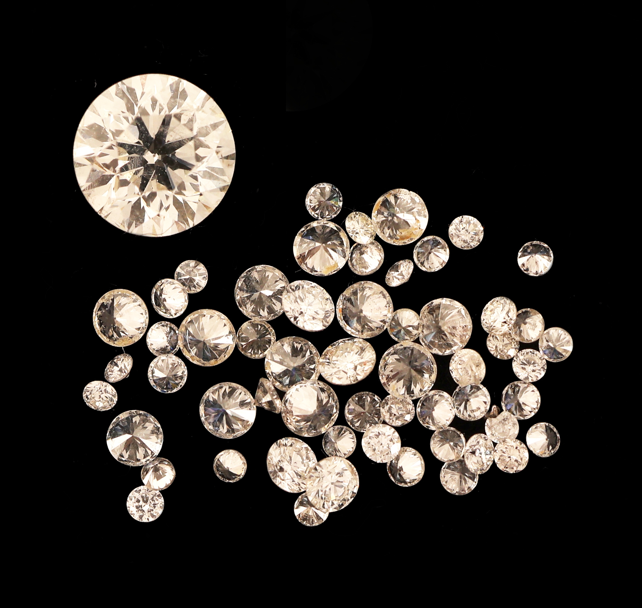 Image 27123465 - Lot lose Brillanten zus. ca. 0.88 ct, 1 x 0.46ct get.Weiß/p, und 1 x ca. 56 Brillanten ...