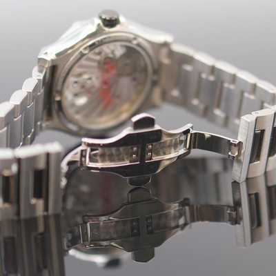 27123759e - KIENZLE Armbandtourbillon in Stahl/Stahlband, um 2000, Handaufzug, beids. vergl. Geh., ...