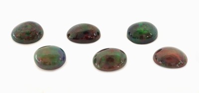 Image 6 lose Schwarzopale, 20.71 ct, ovale Cabochonsin versch. Größen und Farbspielen, wohl ...