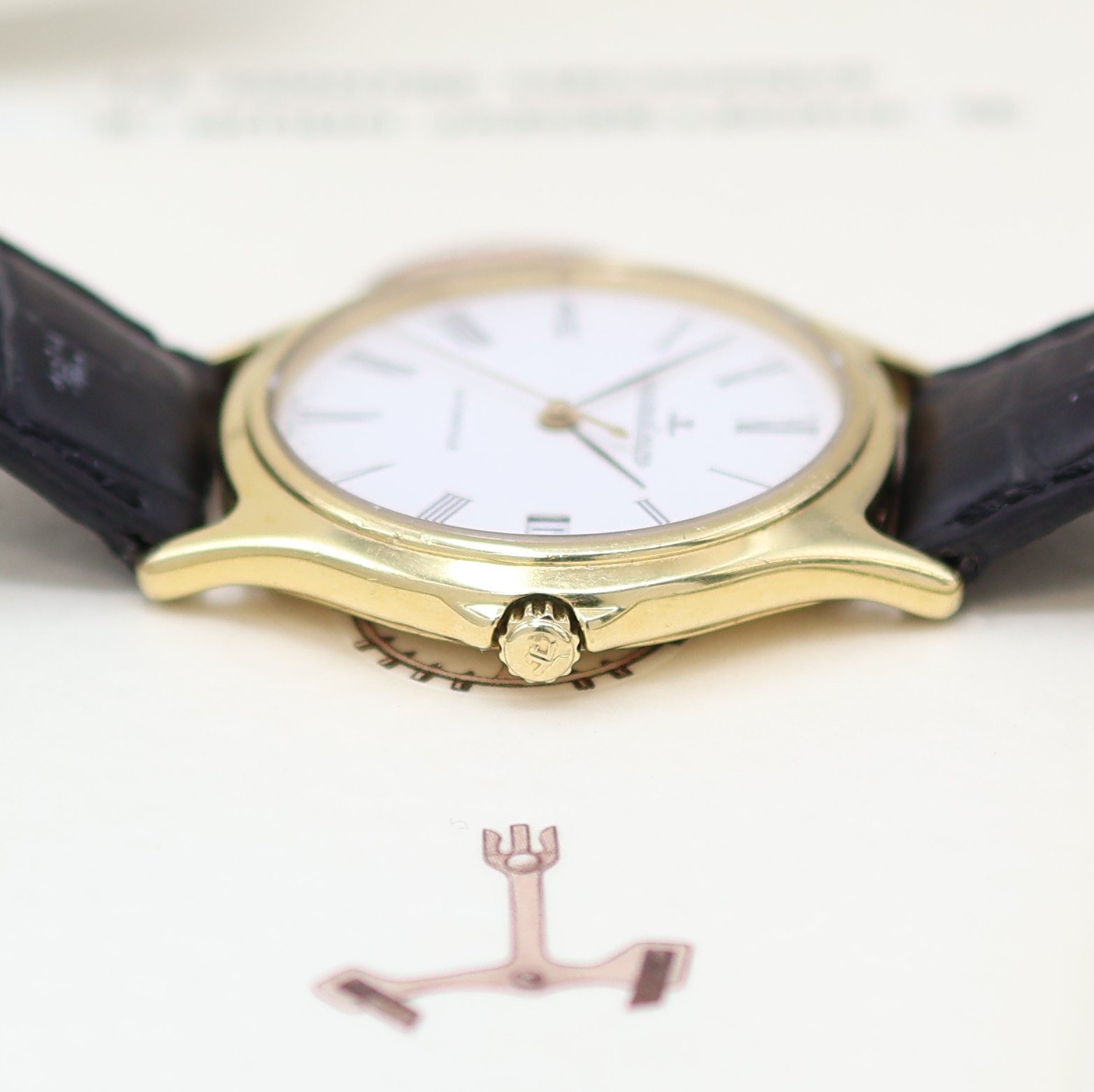Detail c: Jaeger-LeCoultre Heraion Armbanduhr in GG 750/000, Schweiz verk. lt. beil. Pap. 03/1994, Automatik, Boden 4-fach verschr., weißes Zifferbl. m. röm. ...