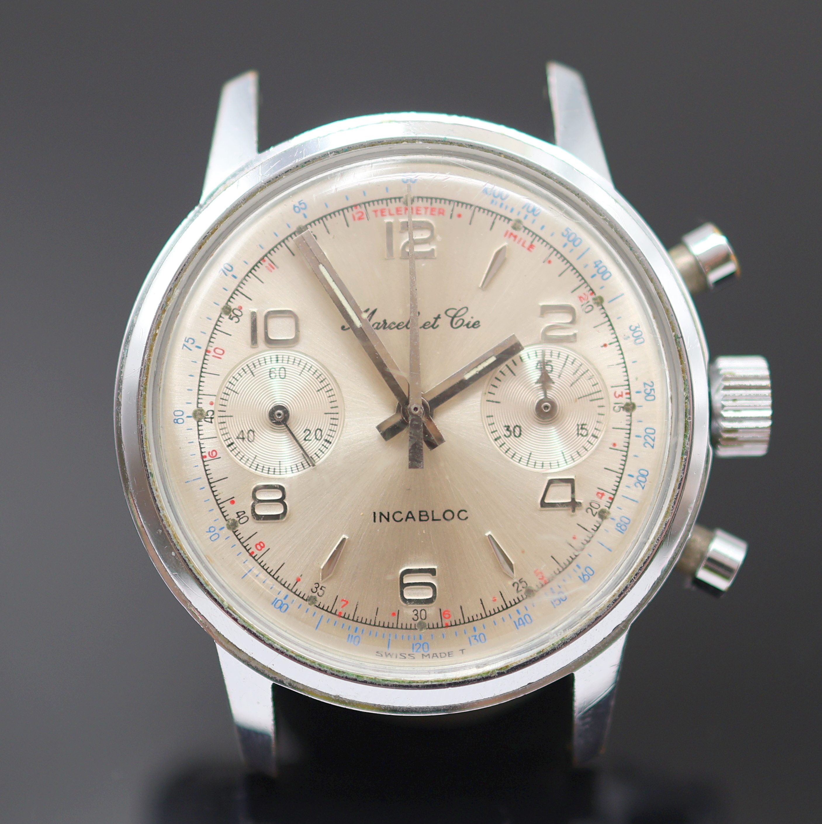 Detail a: MARCEL ET CIE verchromter Armbandchronograph mit Kaliber Valjoux 7733, Schweiz um 1970, Handaufzug, Stahlboden verschr., silb. Zifferbl. m. silb. ...