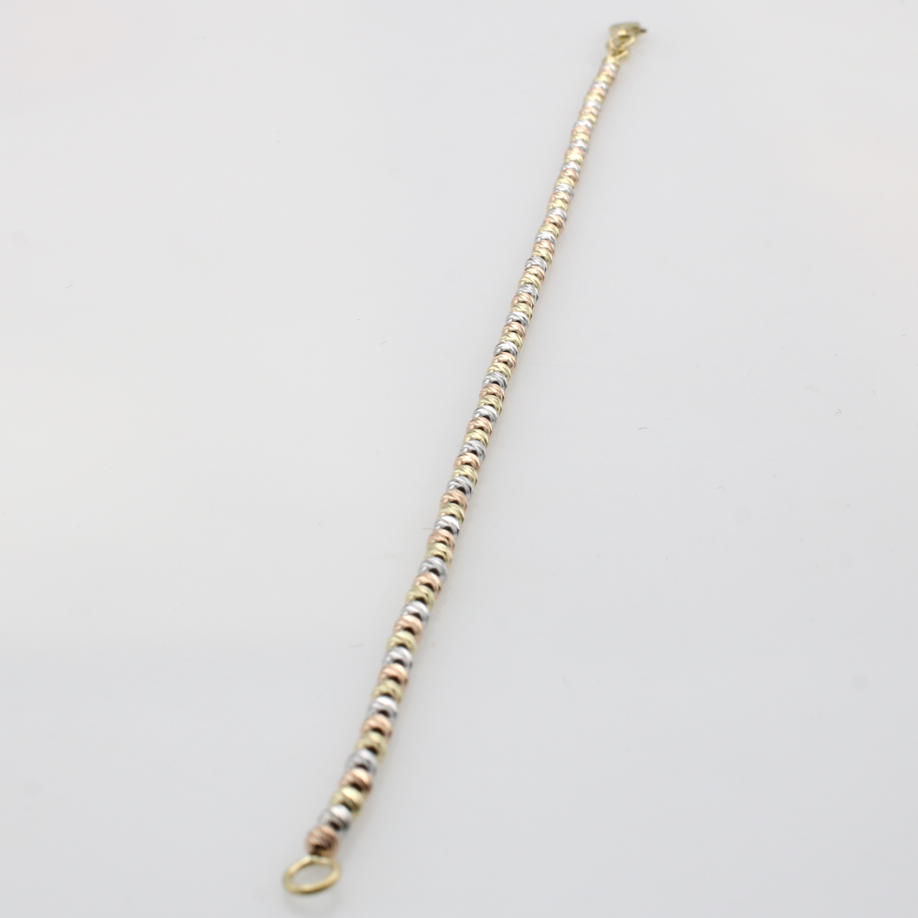 Image 27125530 - Armband, GG/WG/RG 585/000, diam. Kügelchen, D. ca. 2.2 mm, Karabinerschl., L. ca. 18 cm