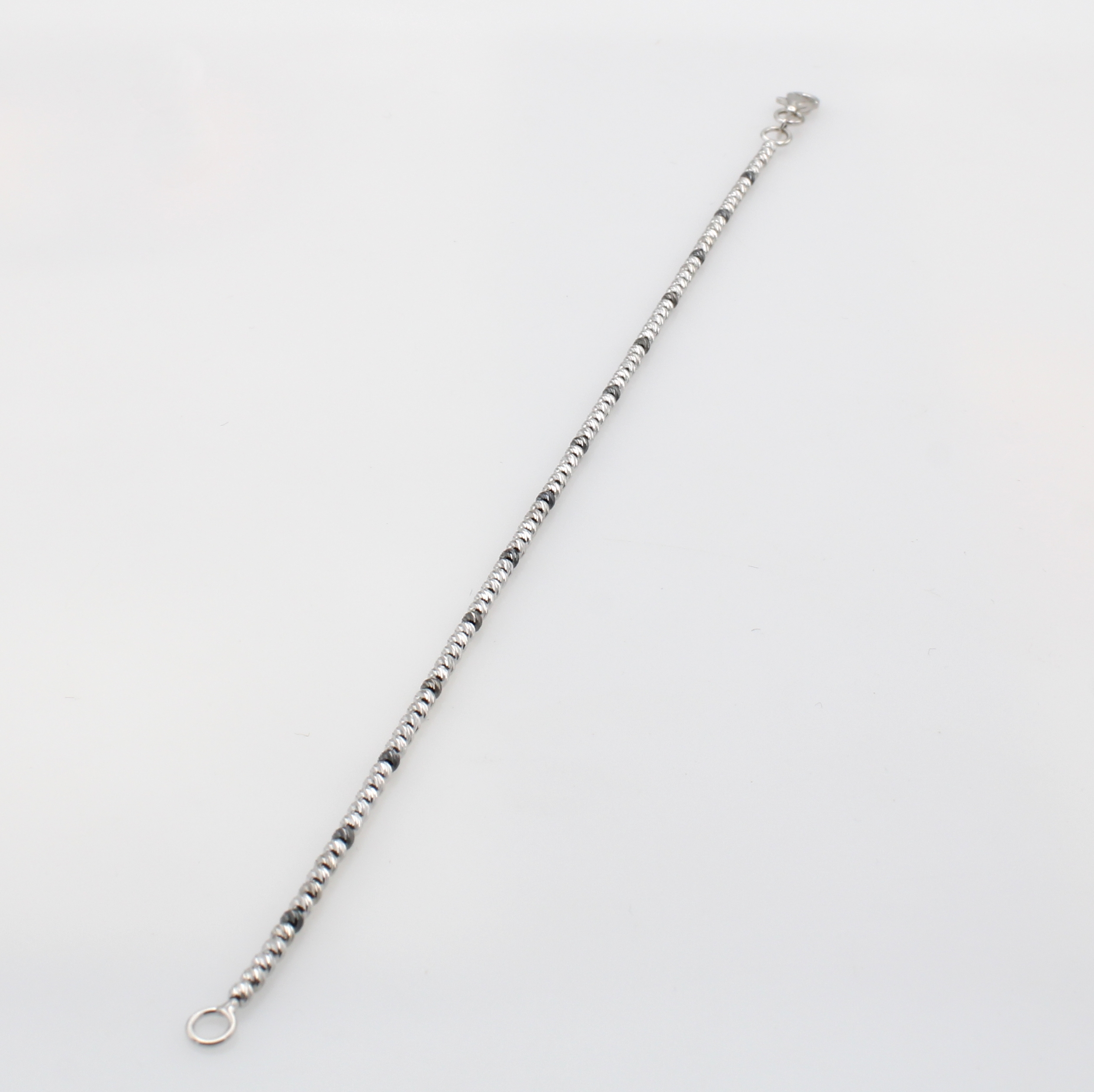 Image 27125537 - Armband, WG 585/000, diam. u. geschwärzte Kügelchen, D. ca. 1.8 mm, Karabinerschl., L. ...