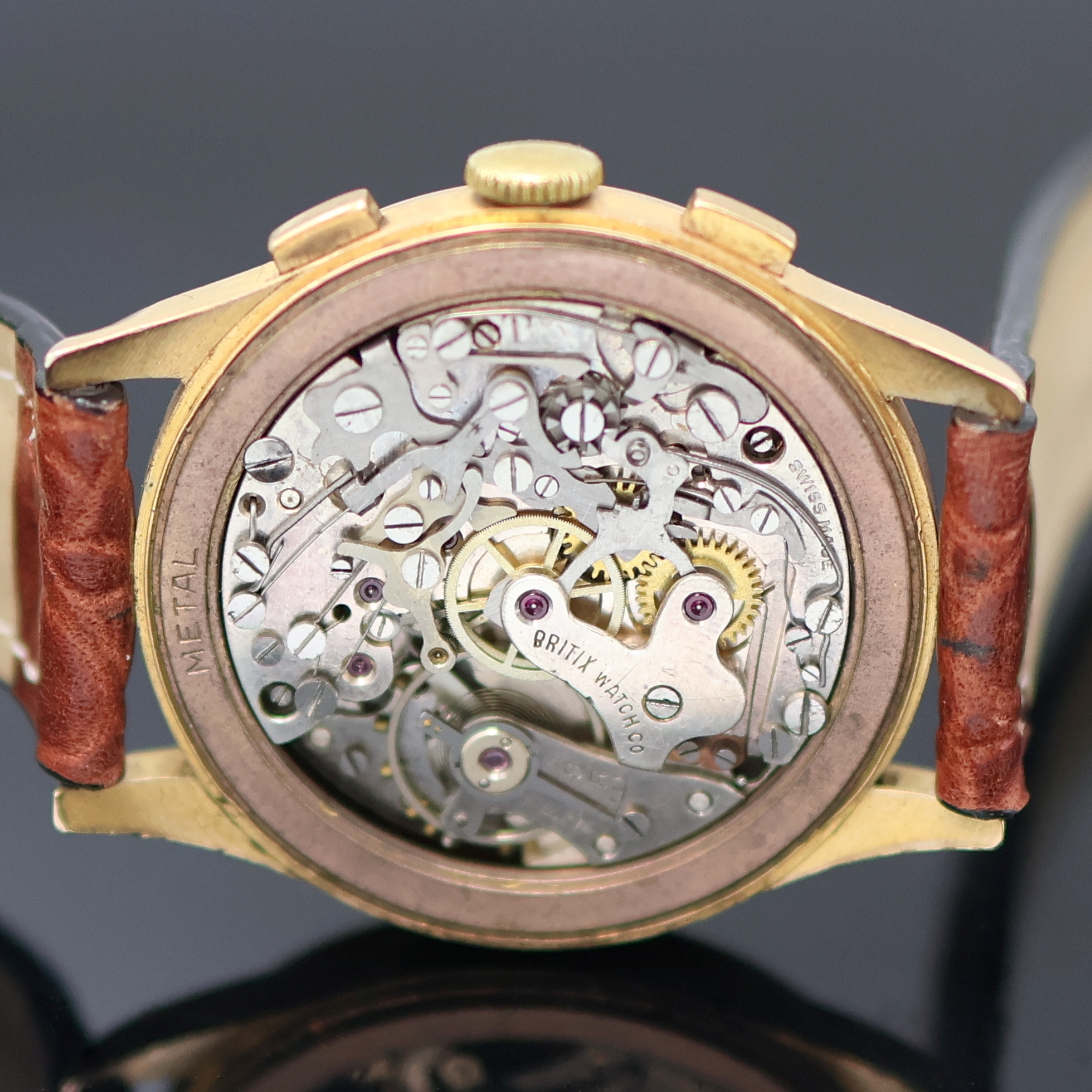 Detail g: CHRONOGRAPHE SUISSE / BRITIX Schaltradchronograph in RG 750/000, Handaufzug, Schweiz um 1950, Geh. dell., Boden und Glasrand aufgedr., verg. Cuvette ...