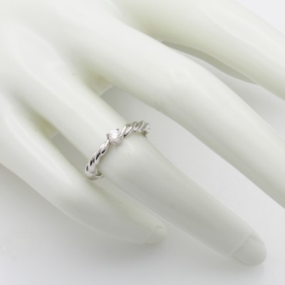 27126276a - Ring mit Brillant, WG 585/000, Schiene z.T. in gedrehter Optik, Brill. in Krappenfassung ...
