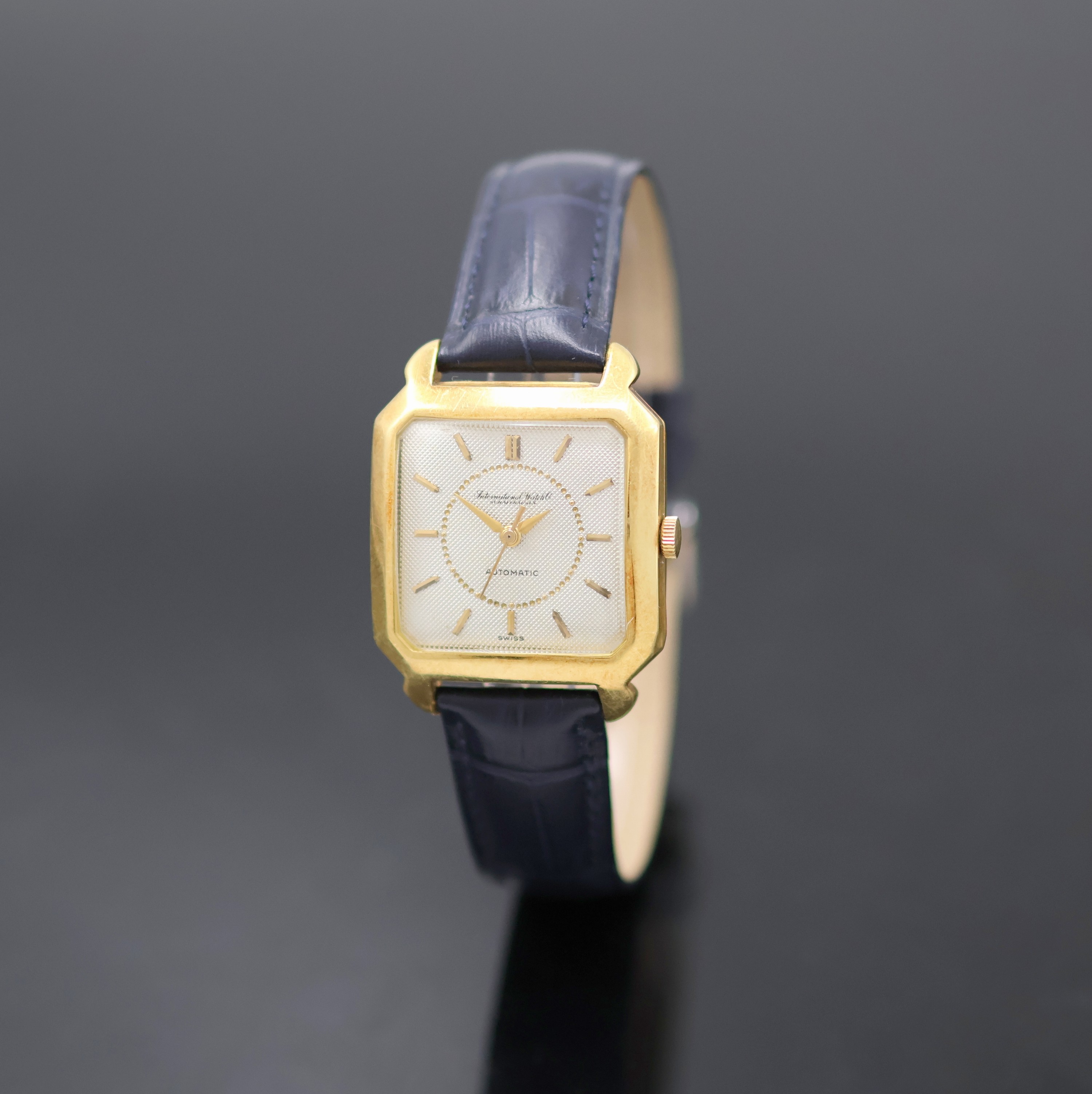 Image 27128730 - IWC quadratische Armbanduhr in GG 750/000, Schweiz um 1952, Automatik, Boden aufgedr., ...