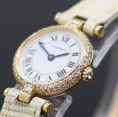 27128734b - CARTIER Vendome Damenarmbanduhr in GG 750/000 mit Brillanten, Schweiz um 1990, quarz, ...