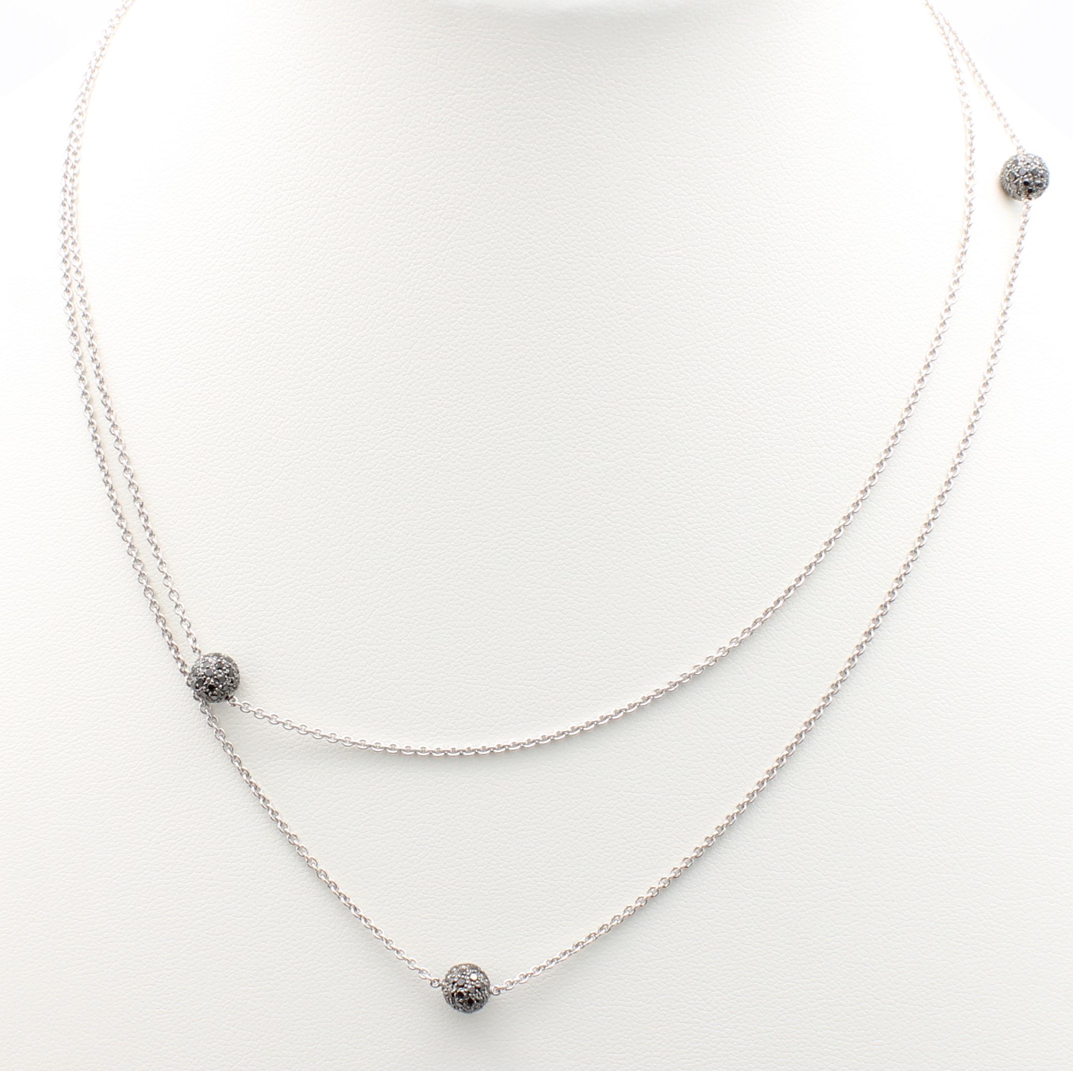 Image 27128950 - Lange Kette mit Diamanten, WG 750/000, 192 Diam. zus. ca. 1.35 ct schwarz (beh.) in 4 ...