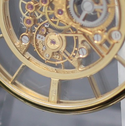 27130107c - COMOR fein skelettierte Taschenuhr in GG 750/000, Schweiz um 1990, Handaufzug, beids. ...