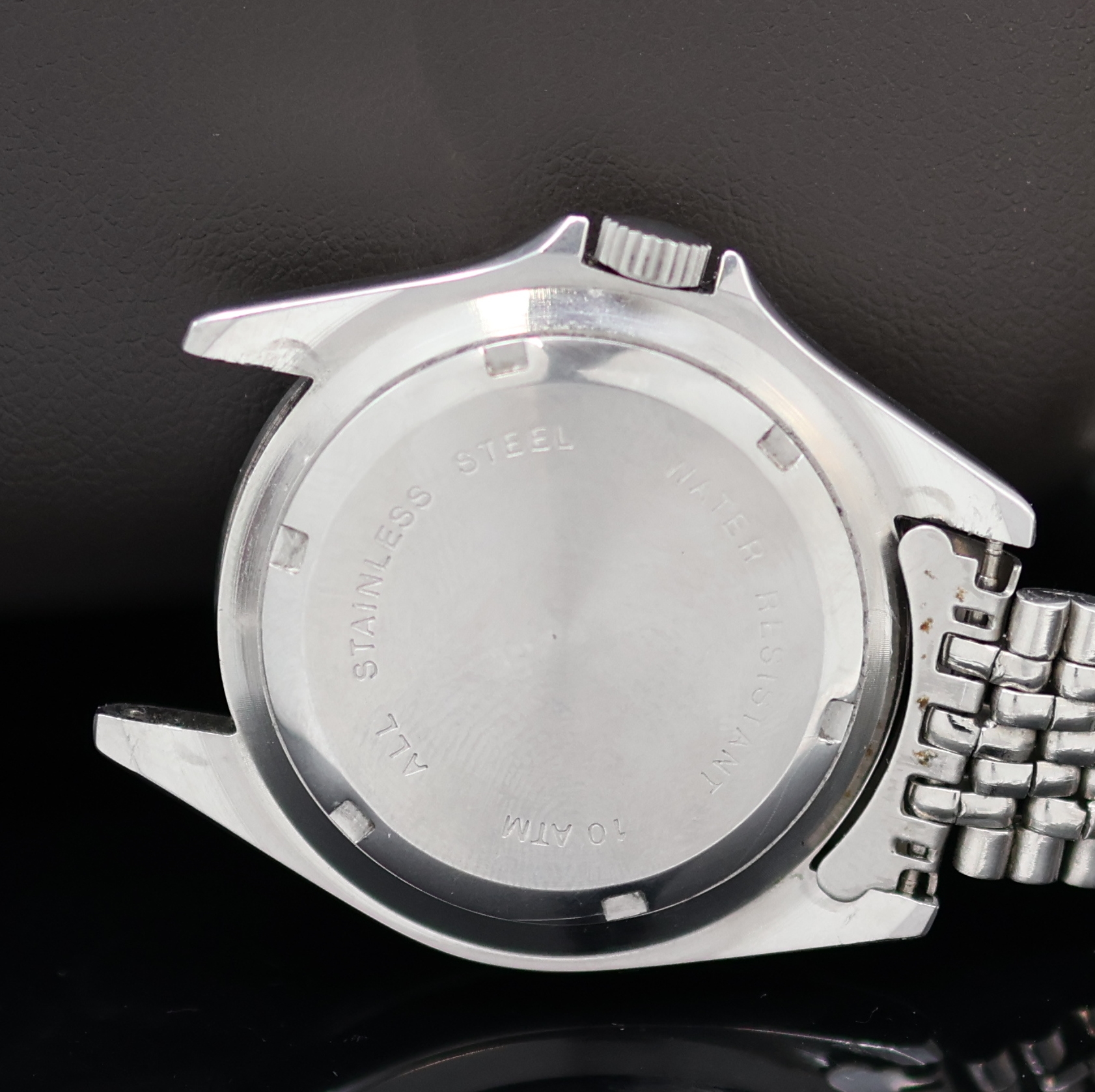 Detail e: GLASHÜTTE Taucheruhr in Edelstahl, Deutschland / Schweiz um 1995, Automatik, Boden verschr., Expandro Stahlband, Lünette m.60er Teilung eins. rast. ...