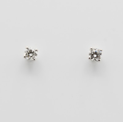 27130407a - Paar Ohrstecker mit Brillanten, WG 585/000, 2 Brill. in Krappenfassung zus. ca. 0.50 ct ...