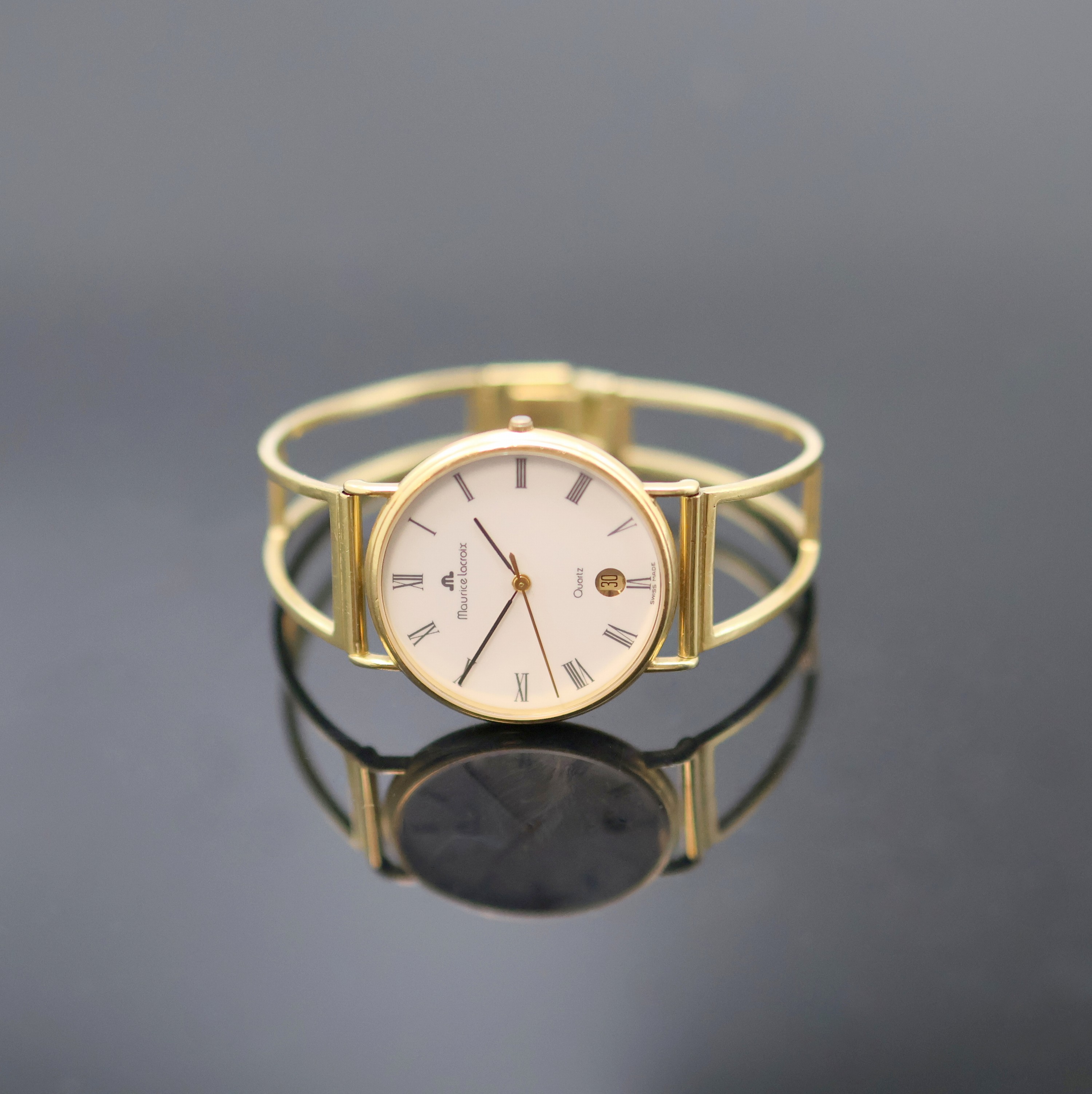Image 27130584 - MAURICE LACROIX Armbanduhr in GG 750/000, quarz, Schweiz um 1990, 2-teil. Geh. inkl. GG ...