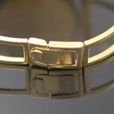 27130584b - MAURICE LACROIX Armbanduhr in GG 750/000, quarz, Schweiz um 1990, 2-teil. Geh. inkl. GG ...