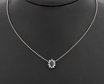 Image 14 kt gold sapphire-diamond-pendant , WG 585/000, centered oval bevelled sapphire ...