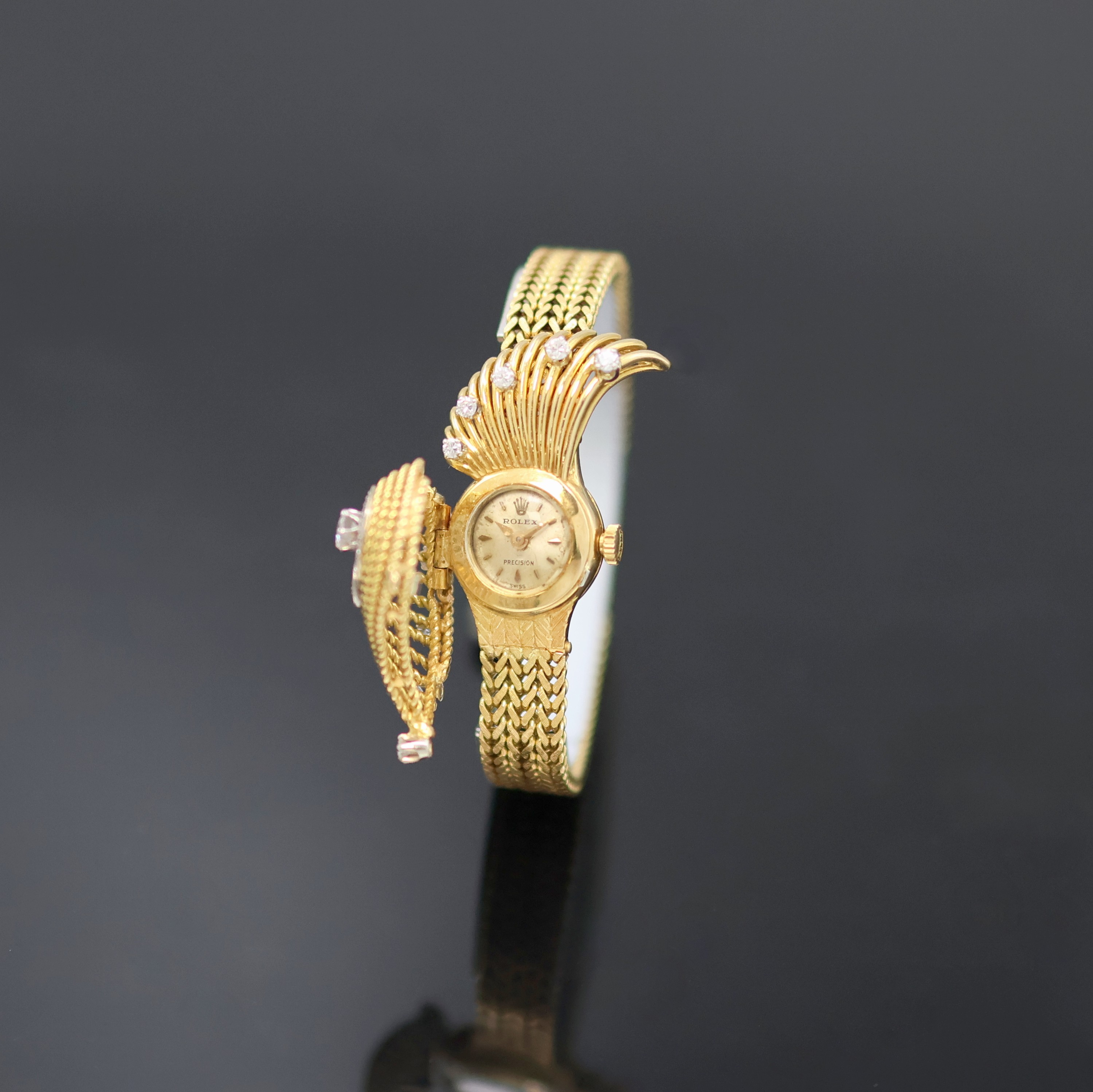 Image 27133338 - BUCHERER / ROLEX ausgefallene Damenarmbanduhr mit Diamantbesatz in GG 750/000, Schweiz ...