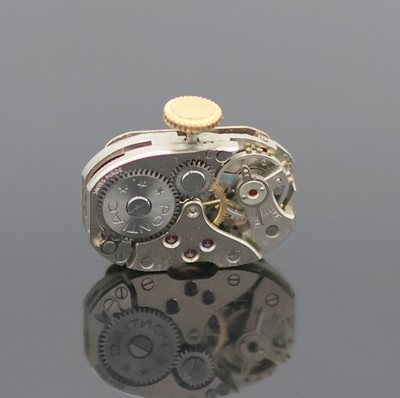 27133339e - ELAN Ringuhr in vergoldetem Silber mit Schmucksteinbesatz, Schweiz um 1945, Handaufzug, ...