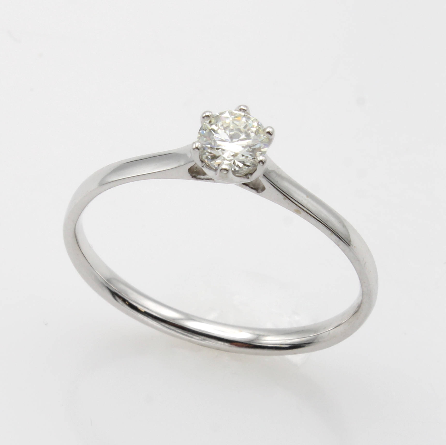Image 27134209 - Ring mit Brillant, WG 585/000, Brill. in Krappenfassung ca. 0.30 ct Weiß/si, RW ca. 56 ...