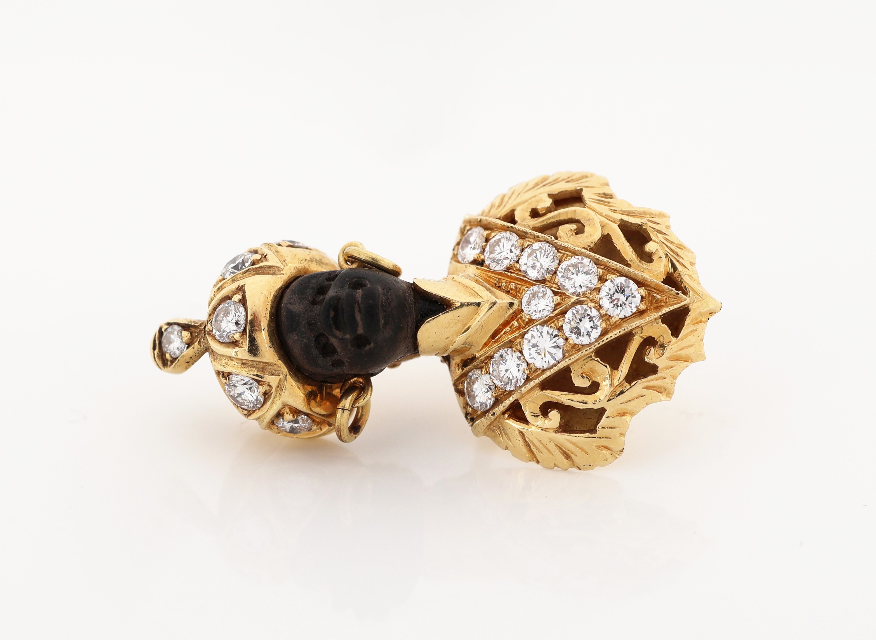 Detail c: 18 kt Gold Ebenholz-Brillant-Stickpin, GG 750/000, Darstellung eines Orientalen, Kopf aus schwarzem Ebenholz geschnitzt, Turban und Brustschmuck mit ...