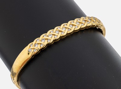 Image 18 kt gold brilliant-bangle , YG 750/000, upper part in braided design, 34 brilliants ...