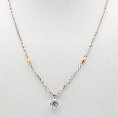 27135144a - Anhänger mit Brillant an Kette, GG/WG 750/ 000, Brill. ca. 0.90 ct feines Weiß/si, L. ...
