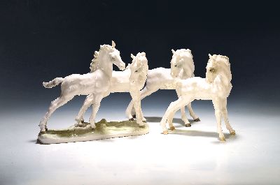 Image Three porcelain figures, Hutschenreuther, pairof foals on a base and two individual ...