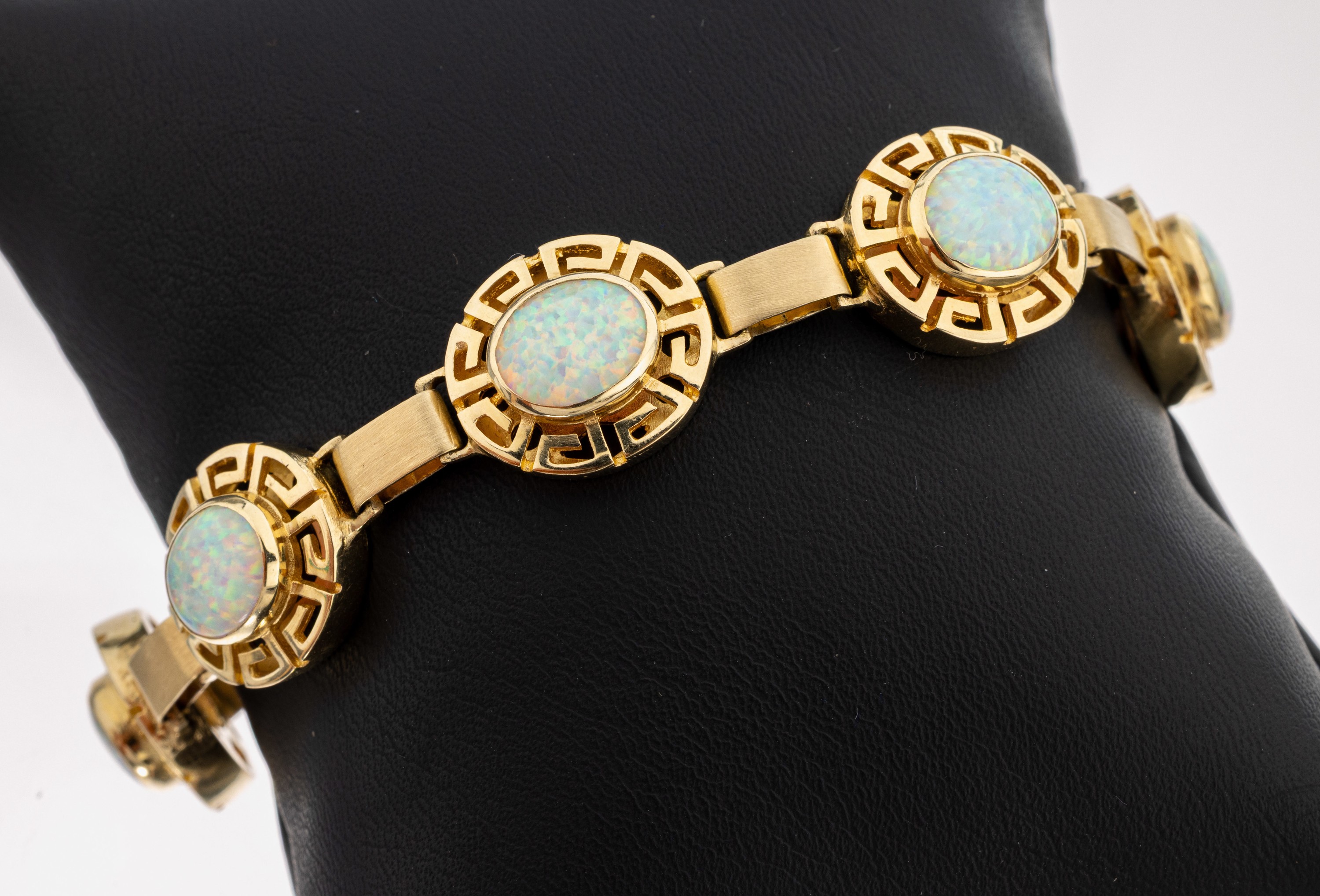 Image 27136823 - 14 kt gold coloured stone-bracelet , YG 585/000, oval links with meander pattern, 7 oval ...
