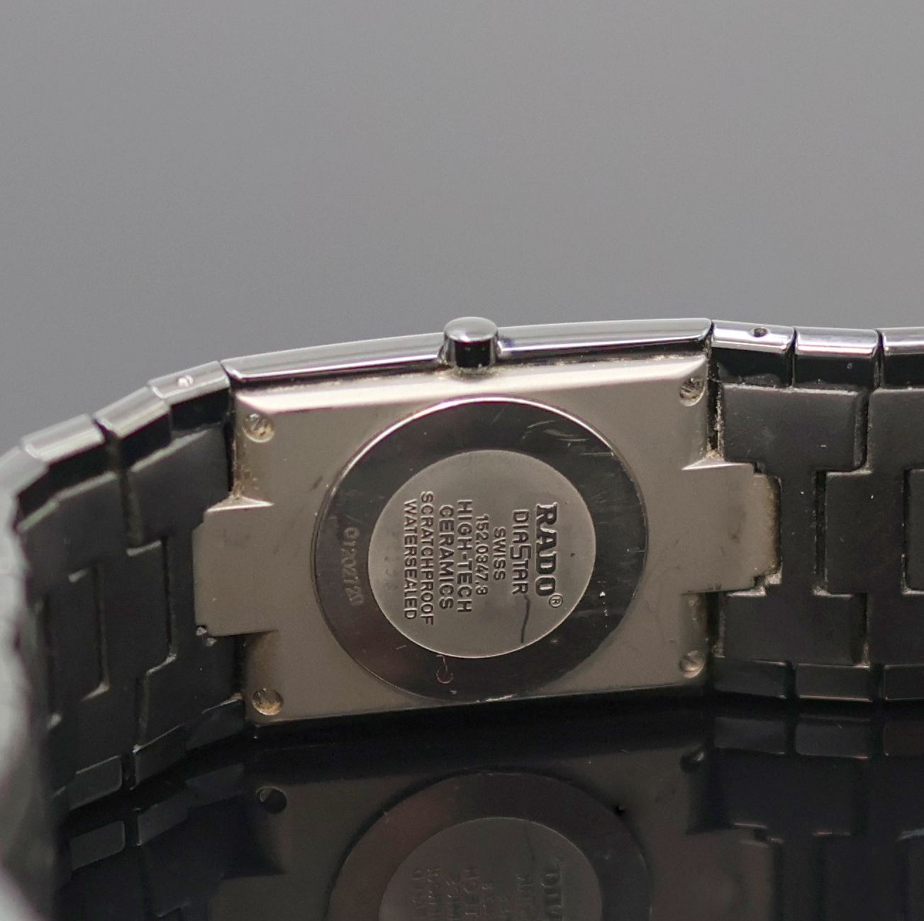 Detail e: RADO Diastar Armbanduhr Referenz 152.0347.3, quarz, Geh. u. Band in High-Tech Keramik, dopp. Faltschl. in Titan, Stahlboden aufgedr.,schwarzes ...