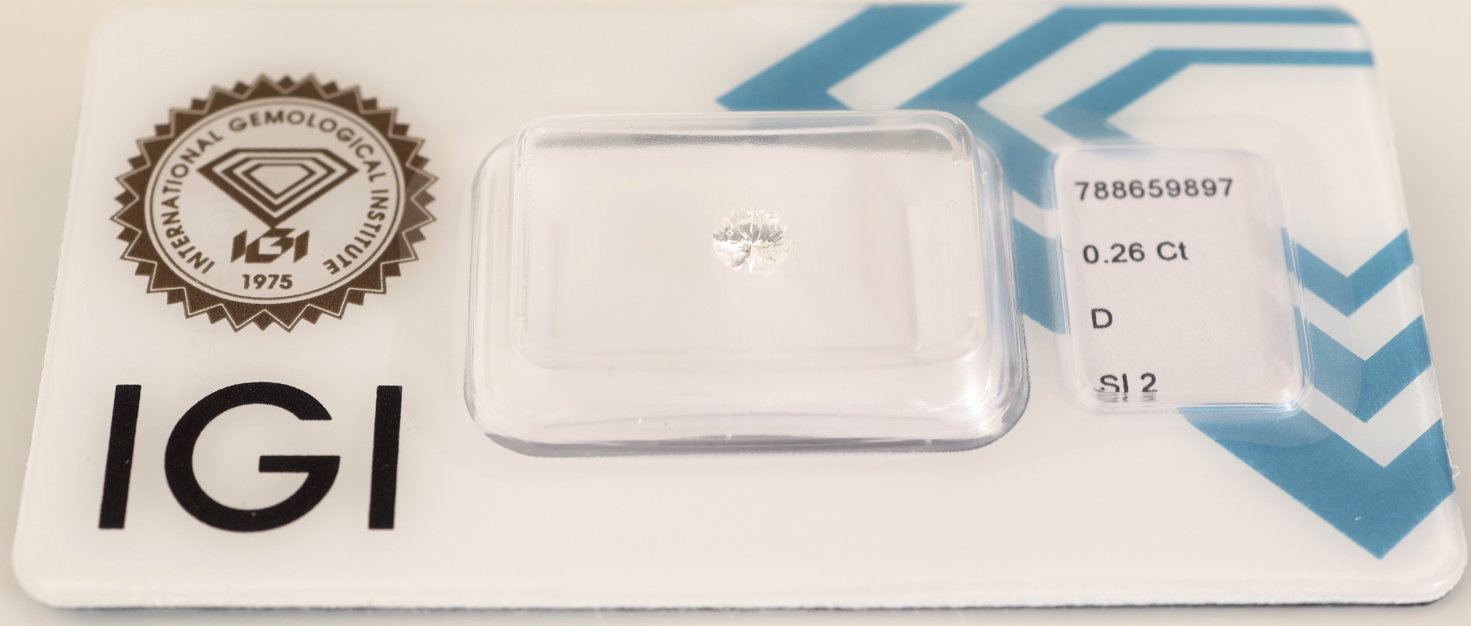 Detail a: Loser Brillant, 0.26 ct hochfeines Weiß+(D)/si2, eingeschweißt, IGI-Expertise anbei