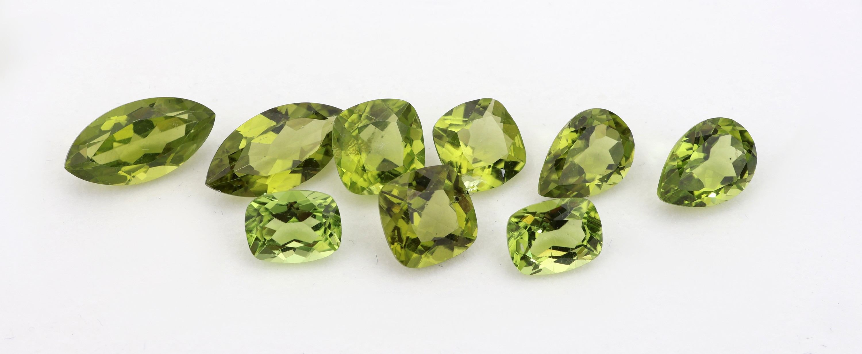 Image 27138254 - Lot 9 lose Peridots, zus. ca. 21.29 ct, versch. Schliffformen und Größen Schätzpreis: ...