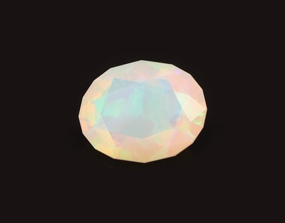 Image Loser Opal, ca. 22.10 ct, ovalfacett., schönesFarbspiel Schätzpreis: 1500, - EUR