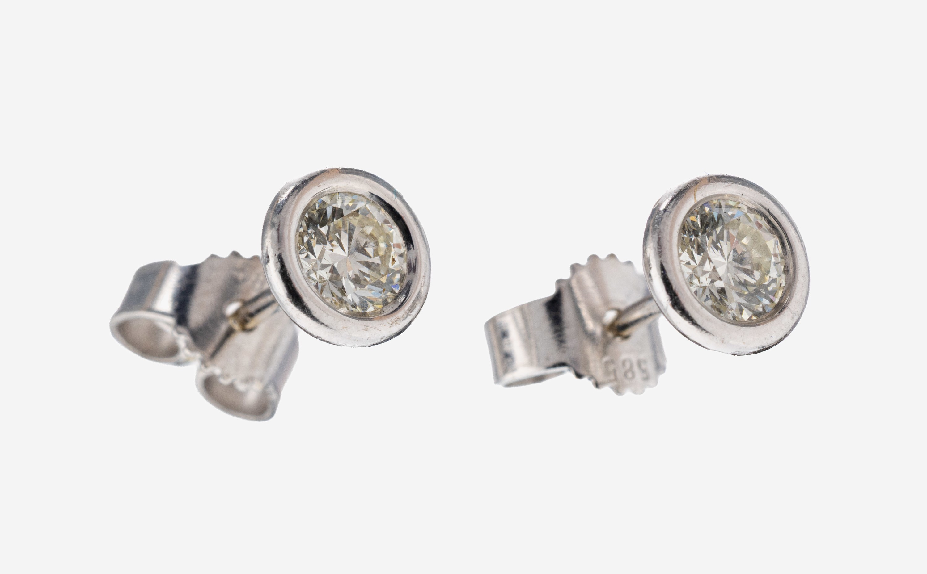 Image 27142060 - Paar 14 kt Gold Brillant-Ohrstecker, WG 585/000, 2 Brillanten zus. ca. 0.65 ct ...