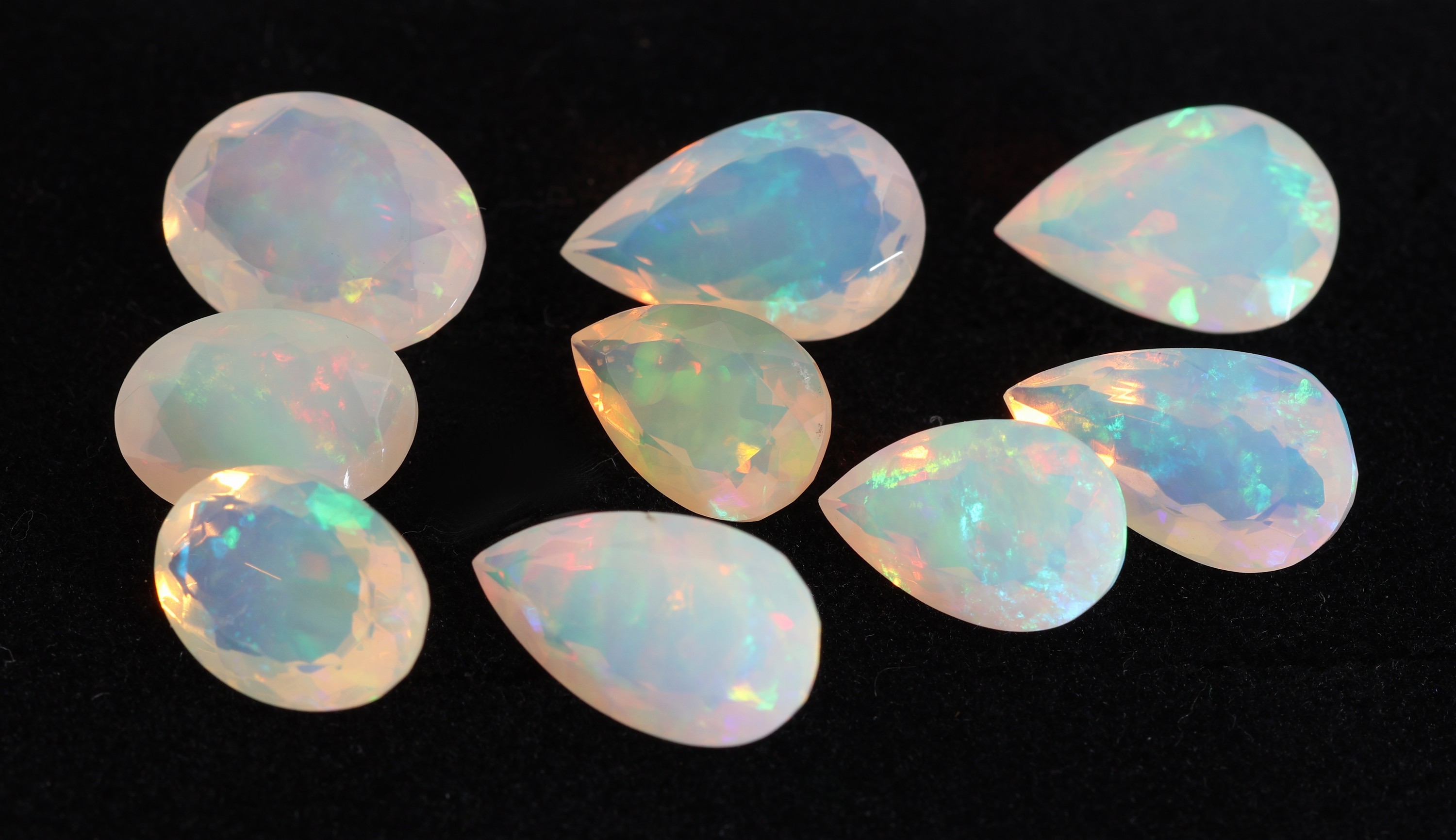 Image 27142303 - Lot 9 loose opals , total approx. 25.53 ct, 6 x bevelled pears, 3 x oval bevelled, ...