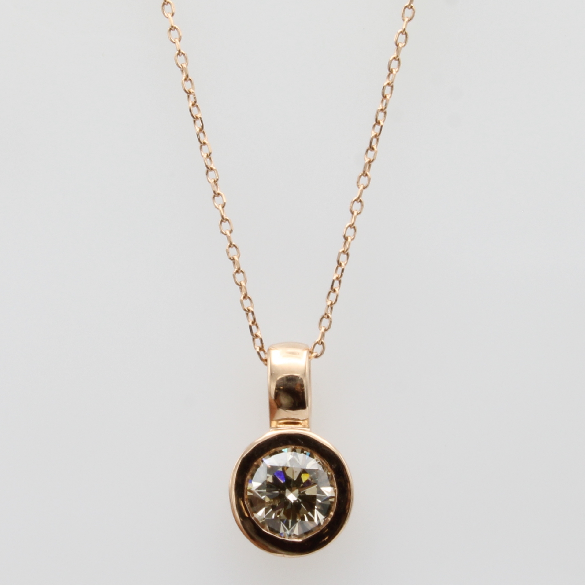Image 27146822 - Anhänger mit Brillant an Kette, RoséG 585/ 000, Brill. ca. 1.026 ct Braun/si, in L. ...