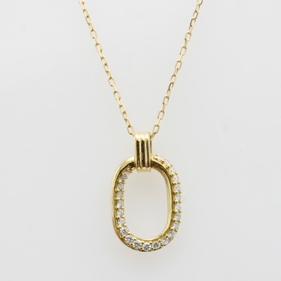 Image Anhänger mit Brillanten an Kette, GG 750/000, ovaler Anhänger z.T. auch innen bes. m. ...
