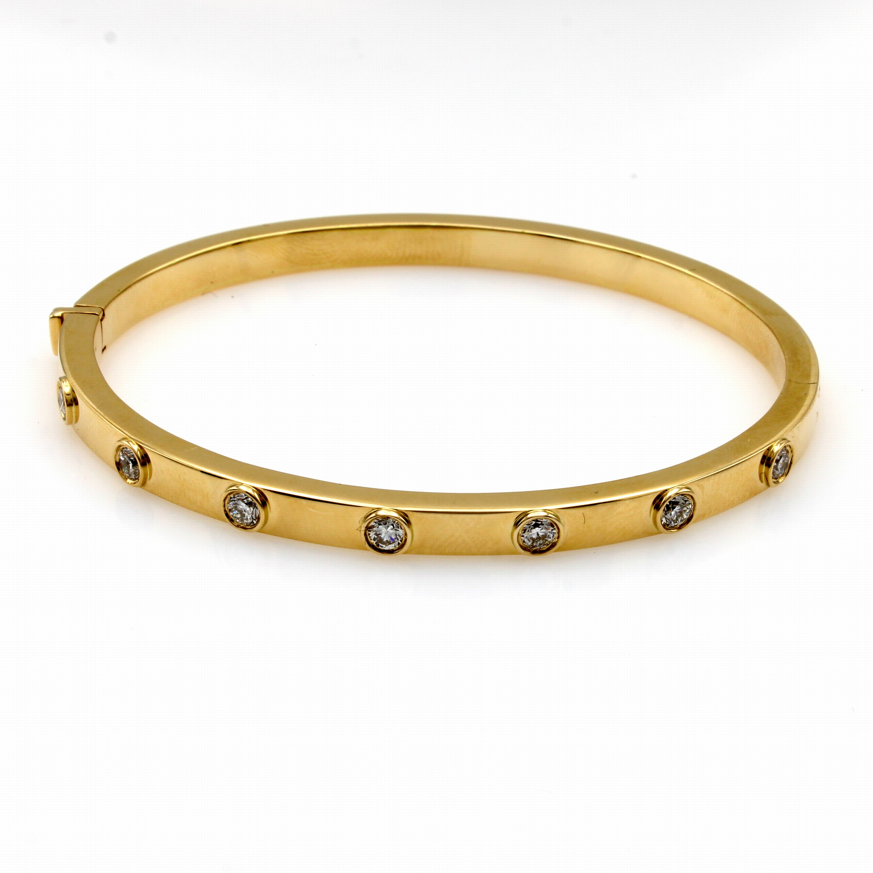 Image 27148956 - Armreif mit Brillanten, GG 585/000, 7 Brill. in glatten Fassungen zus. ca. 1 ct ...