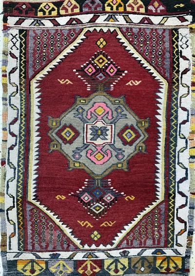 27149304h - 4 Yastik & Kilim, Turkey & Persia, early 20th century, wool on wool, approx. 110 x 65 cm, ...