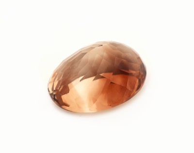 27161392a - Loser Imperial Topas, ca. 14.96 ct, ovalfacett. Schätzpreis: 650, - EUR