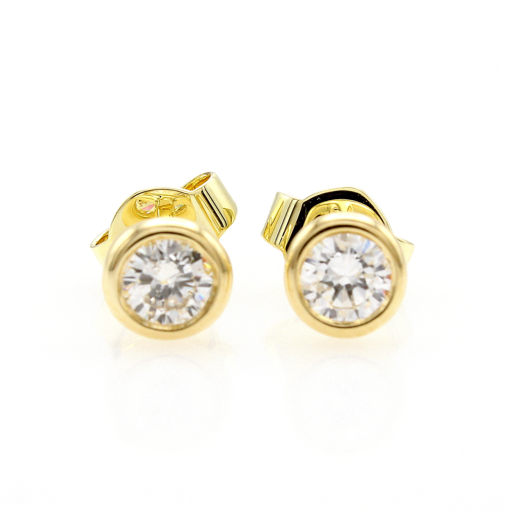 Image 27164326 - Paar Ohrstecker mit Brillanten, GG 585/000, 2 Brill. in Zargenfassungen zus. ca. 0.44 ct ...